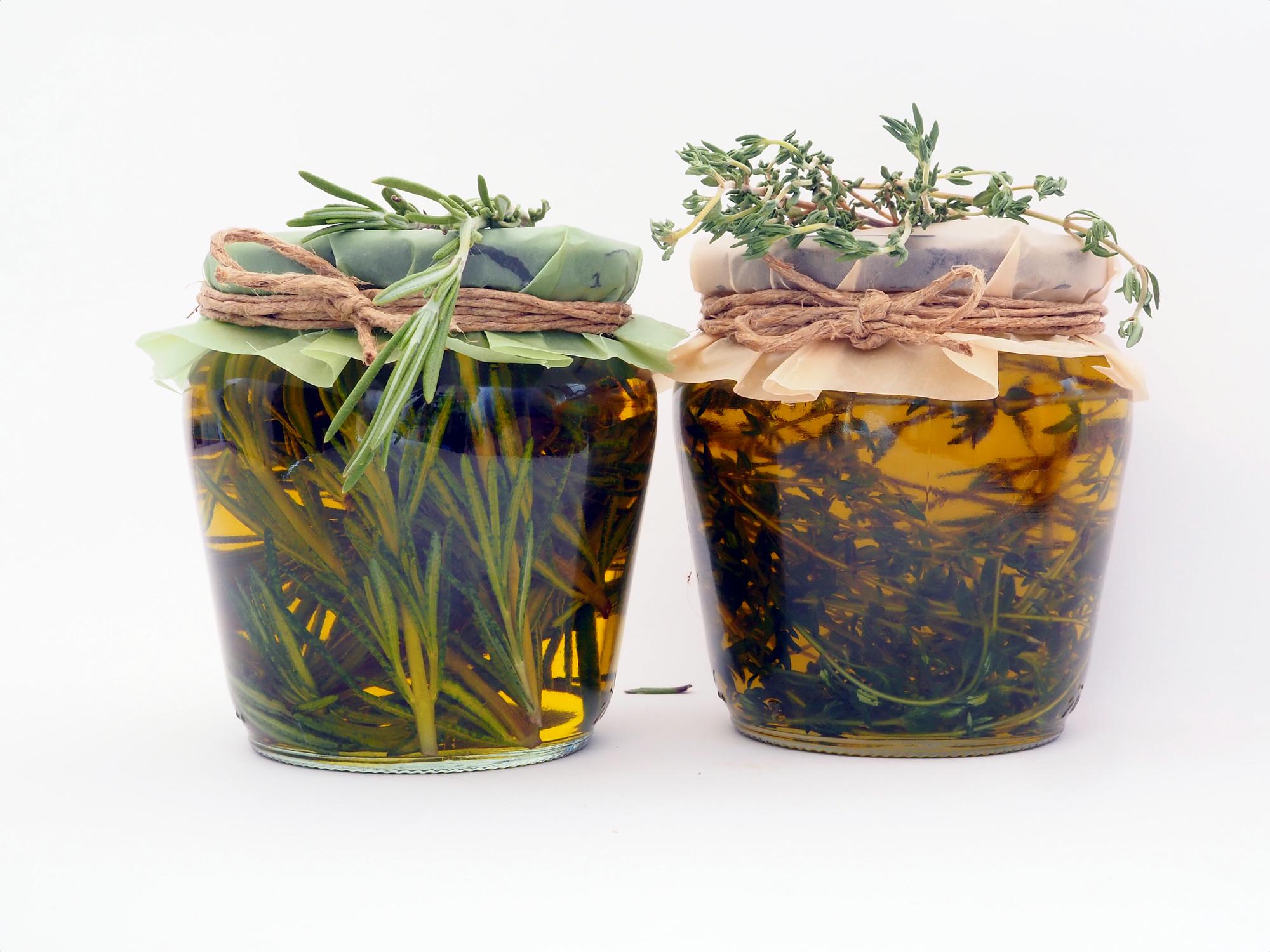 Close-up of fermented jar and herbs on counter